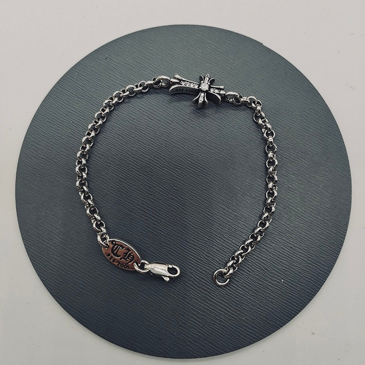 CROSSLINK CHARM BRACELET